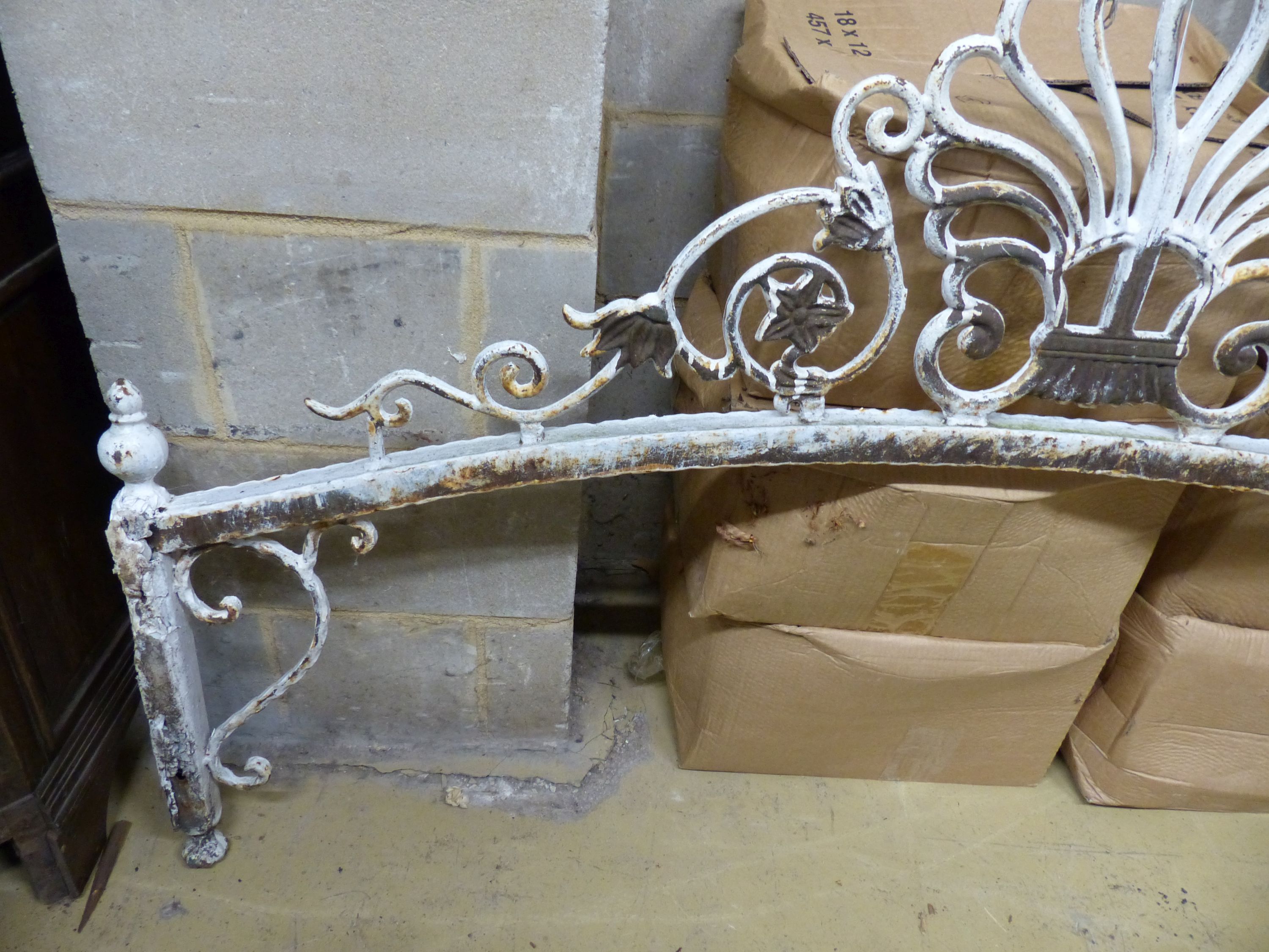 A wrought iron archway, width 168cm